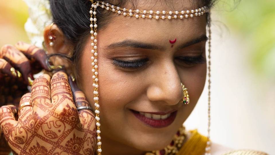 Bridal close-up with nath and henna